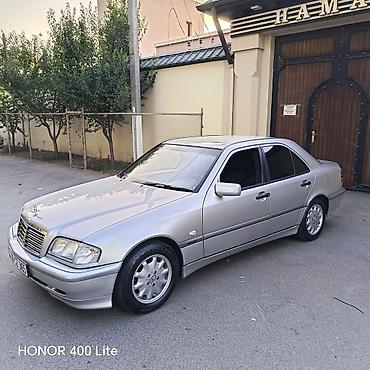 traktor farası: Mercedes-Benz C 200: 2 l | Sedan — 2