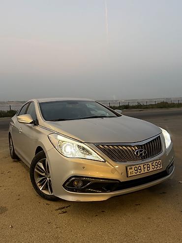 masin maqnitofon: Hyundai Grandeur: 2.2 l | 2014 il Sedan — 1