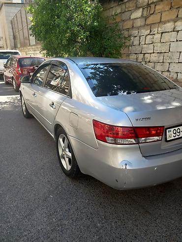 Hyundai: Hyundai Sonata sedan – gümüşü rəng, 5 qapı, ön çəkişli. Texniki və — 6