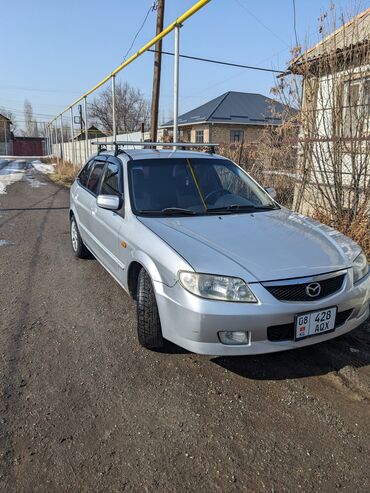 автомобили электро: Mazda 323: 2001 г., 1.6 л, Механика, Бензин, Универсал