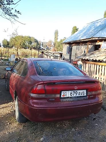 авто маркер: Mazda 626: 1994 г., 1.8 л, Механика, Бензин, Седан — 2