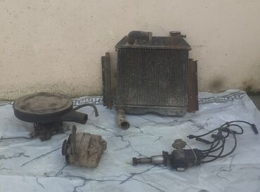 Motor üçün digər detallar: Radiator - 100 ₼ Karbirator(jiquli) - 80₼, Tramblyor - 40 ₼ Babin — 1
