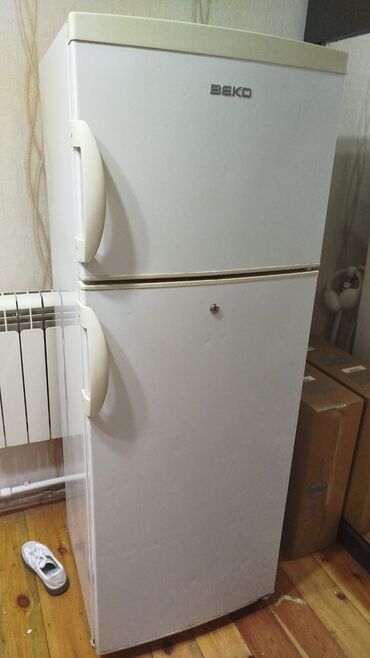 marazilka xaladelnik: Б/у 2 двери Beko Холодильник Продажа, цвет - Белый, С колесиками