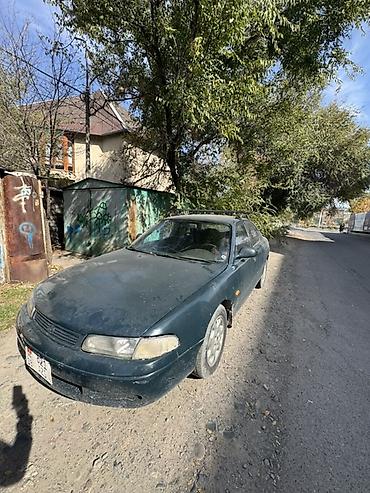 выхлоп на 210: Mazda 626: 1995 г., 1.8 л, Механика, Бензин, Седан — 2