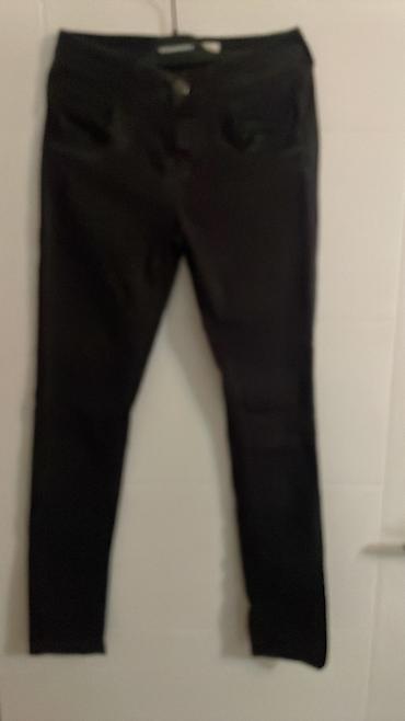 Lične stvari: Ženske pantalone Miss Mosh – model u crnoj boji, uskog (skinny) kroja — 1