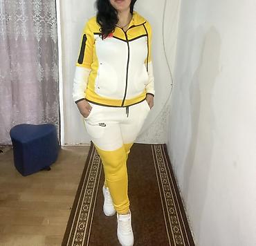 buzz nike tn patike: Dvodelni ženski komplet trenerki u žuto-beloj kombinaciji. - — 6