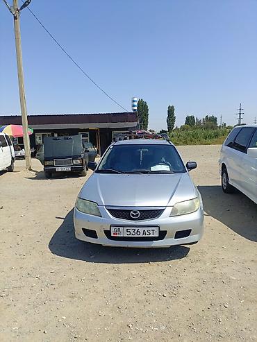 мицу биси: Mazda 323: 2002 г., Механика, Бензин, Универсал — 1