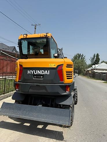 экскаватор w60: Колесный экскаватор Hyundai HW60ECO в желто-серой цветовой гамме — 2