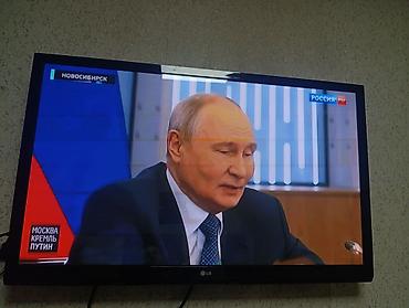 игровой консол: Телевизор LG, диагональ экрана около 42–47". Плоская панель, черная — 1