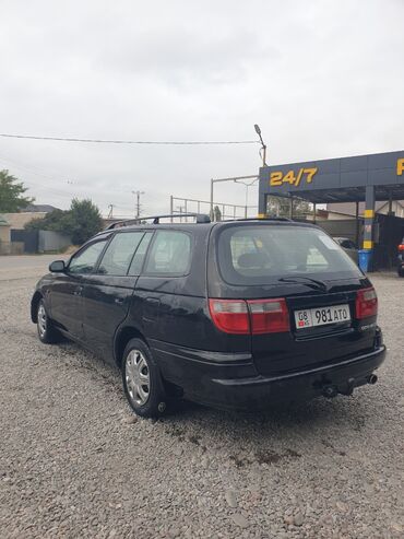 срочно продам авто в связи с переездом: Toyota Carina E: 1996 г., 1.8 л, Механика, Бензин, Универсал