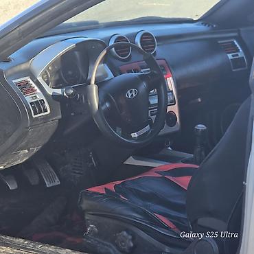 куплен: Hyundai Tiburon: 2001 г., Механика, Бензин, Купе — 5