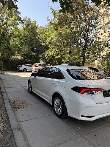 e5 olom: Toyota Corolla: 2022 г., 1.8 л, Вариатор, Гибрид, Седан — 6