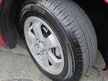 prius qranat: Toyota Prius (2-ci nəsil) hibrid hetçbek - Rəng: qırmızı - Kuzov: 5 — 6