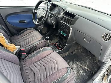 Daihatsu: Daihatsu Cuore: 2005 г., 1 л, Механика, Бензин, Хэтчбэк — 8