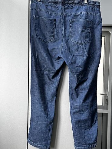Cinslər: Kişi üçün tünd mavi rəngdə denim şalvar - Model: Jogger üslubunda — 2