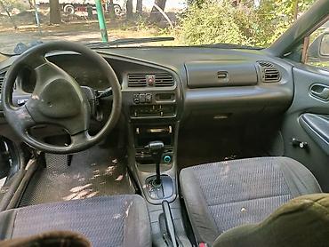 Транспорт: Mazda 323, седан, приблизительно конец 1990‑х – начало 2000‑х годов — 3