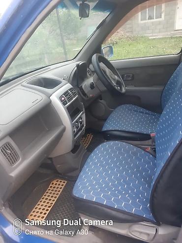 2 4 д: Nissan Cube: 2001 г., 1.3 л, Автомат, Бензин, Универсал — 10