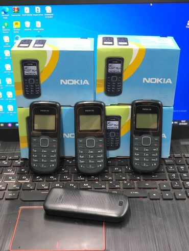 Nokia: Модель NOKIA 1202
Одна симочная 
Качество супер