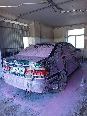 385 55: Mazda 626: 1998 г., Механика, Седан — 10