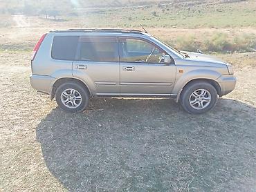 nissan note bufer: Nissan X-Trail (T30) – gümüşü rəngli, benzinlə çalışan kompakt SUV — 1