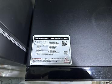 power bank smart: Samsung mikrodalğalı soba – qara rəng, ön şüşə qapı və sağ tərəfdə — 2