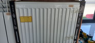 Radiatorlar: İstilik sistemləri üçün nəzərdə tutulmuş, ağ rəngli, polad materialdan