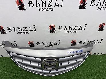 гранаты мазда: Решетка радиатора Mazda 2002 г., Б/у, Оригинал — 2