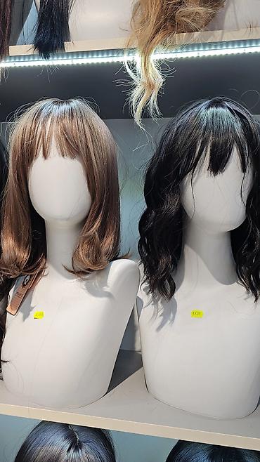 Парикмахеры: Предлагается широкий ассортимент париков, представленных в различных — 5