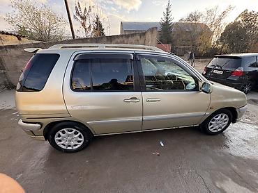 продаю или минаю: Toyota Raum: 2002 г., 1.5 л, Бензин, Минивэн — 4