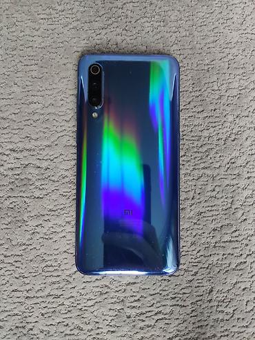 mi 9 plata: Xiaomi Mi 9, 64 GB, rəng - Mavi, 
 Sensor, Barmaq izi, Simsiz şarj — 1