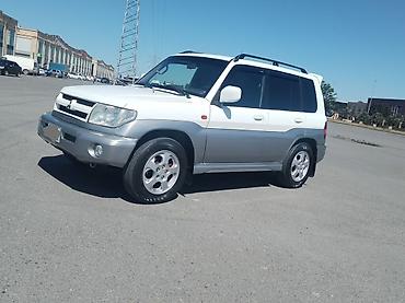 Mitsubishi Pajero iO 4WD kompakt yolsuzluq avtomobili. Avtomobilin at lalafo.az — 9 Mitsubishi Pajero iO 4WD kompakt yolsuzluq avtomobili. Avtomobilin — 9
