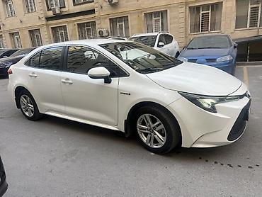 xpeng g3: Toyota Corolla: 2022 г., 1.8 л, Вариатор, Гибрид, Седан — 2