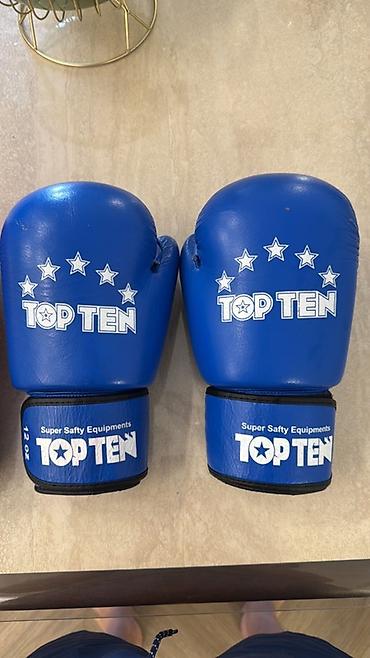 king boxing: Боксерские перчатки TOP TEN - Пара перчаток бренда TOP TEN. - Цвета — 2