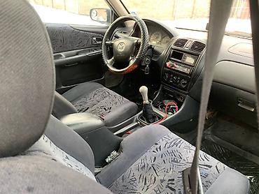 Mazda: Mazda 323: 2000 г., 1.8 л, Механика, Бензин, Универсал — 7