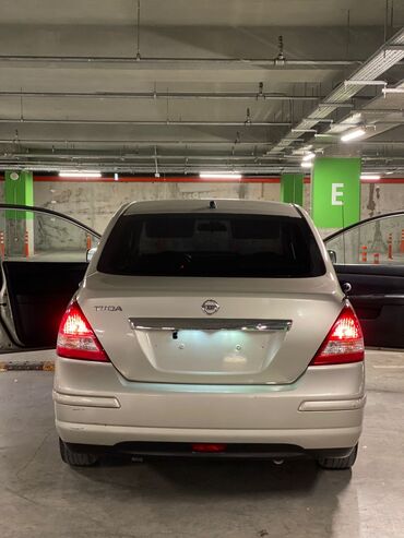 Nissan: Nissan Tiida sedan - Kül rəngə çalan açıq-bej eksteryer - 4 qapılı -da lalafo.az — 9 Nissan: Nissan Tiida sedan - Kül rəngə çalan açıq-bej eksteryer - 4 qapılı — 9