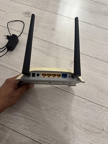Модемы и сетевое оборудование: Wi‑Fi роутер TP‑Link с двумя внешними антеннами и блоком питания в — 3