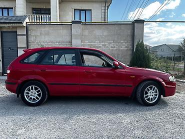 e6 3: Mazda 323: 1999 г., 1.8 л, Автомат, Бензин, Хэтчбэк — 4