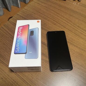 телефон fly громкий: Xiaomi Redmi Note 9S, 128 ГБ, цвет - Голубой, 
 Отпечаток пальца, Беспроводная зарядка, Две SIM карты