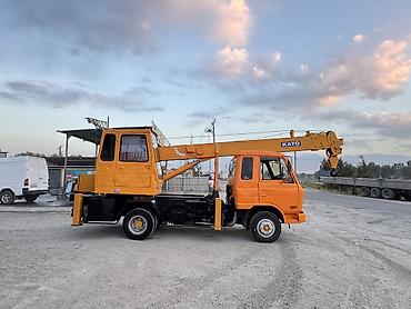 тон май алам: Автокран, Nissan, 1994 г., 21 м — 2