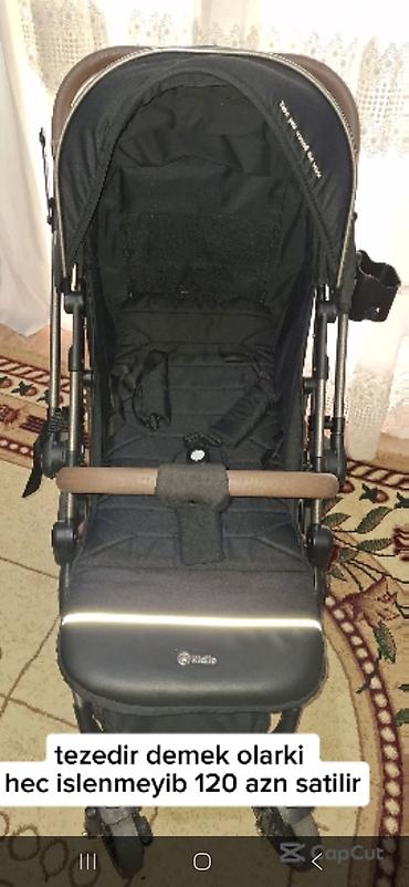 Uşaq arabaları: Uşaq arabası – Kidilo markası, qara rəng. Xüsusiyyətlər: - Yığcam — 1