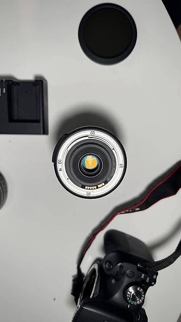 Фотоаппараты: Зеркальная камера Canon EOS 2000D с комплектом аксессуаров. Состав — 9