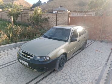передний бампер опель вектра б: Автомобиль Daewoo Nexia золотистого цвета с кузовом седан. Машина