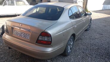 yan guzgulər s: Daewoo Leganza: 1.8 l | 2001 il Sedan