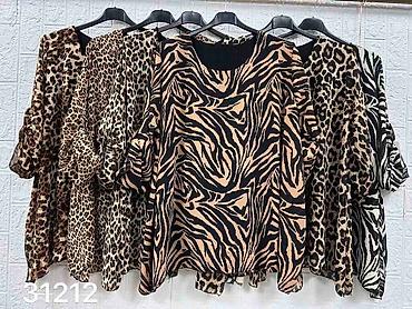 kompleti zenski zara: Tunike za punije
Cena 2100
Vel. Do 5xl
V15 — 3