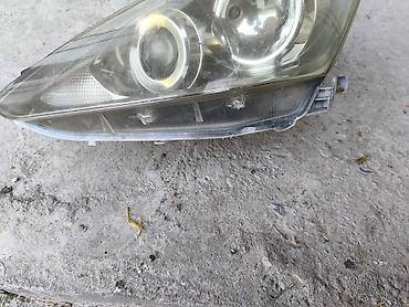 Передняя левая фара Toyota Caldina рестайл 1 ушко сломано, на фото