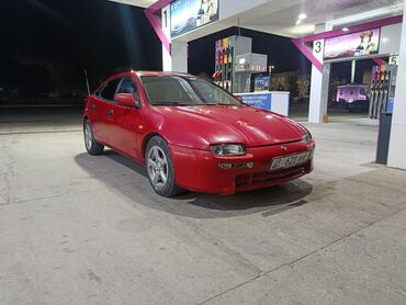 победа машина: Mazda 323: 1994 г., 1.5 л, Механика, Бензин, Хэтчбэк