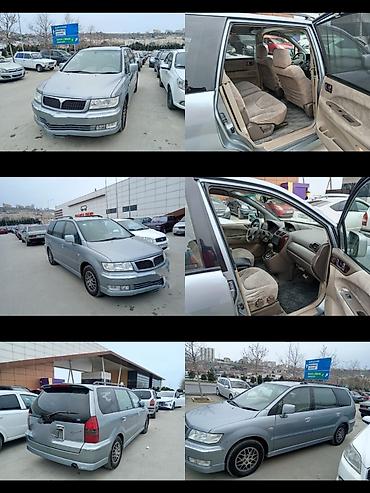 mitsubishi attrage: Mawin satilir. 7 neferlik. Ideal veIyyetdedir. Kondiaioneri — 1