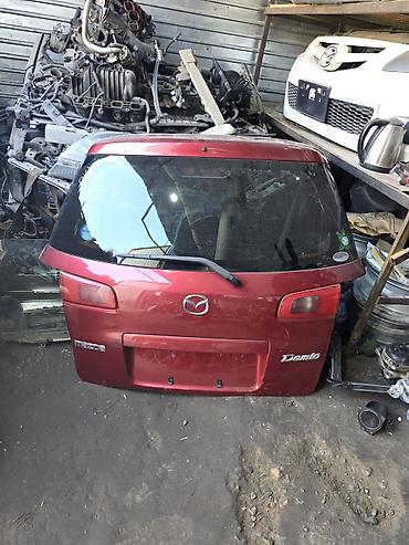 mazda 2000: Крышка багажника Mazda, 2003 г., Б/у, Оригинал — 2