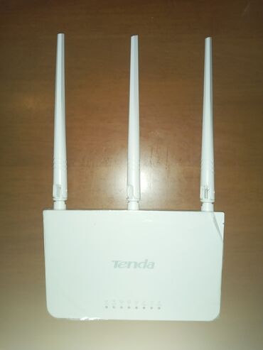 modem fiber optic: Tenda modem 30 manat tezedir
