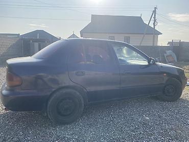 Другие автомобили: Седан компакт-класса, 4 двери, темно-фиолетовый цвет. Кузов с — 7